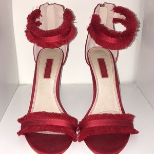 Top shop; red high heels with zippers in the back.